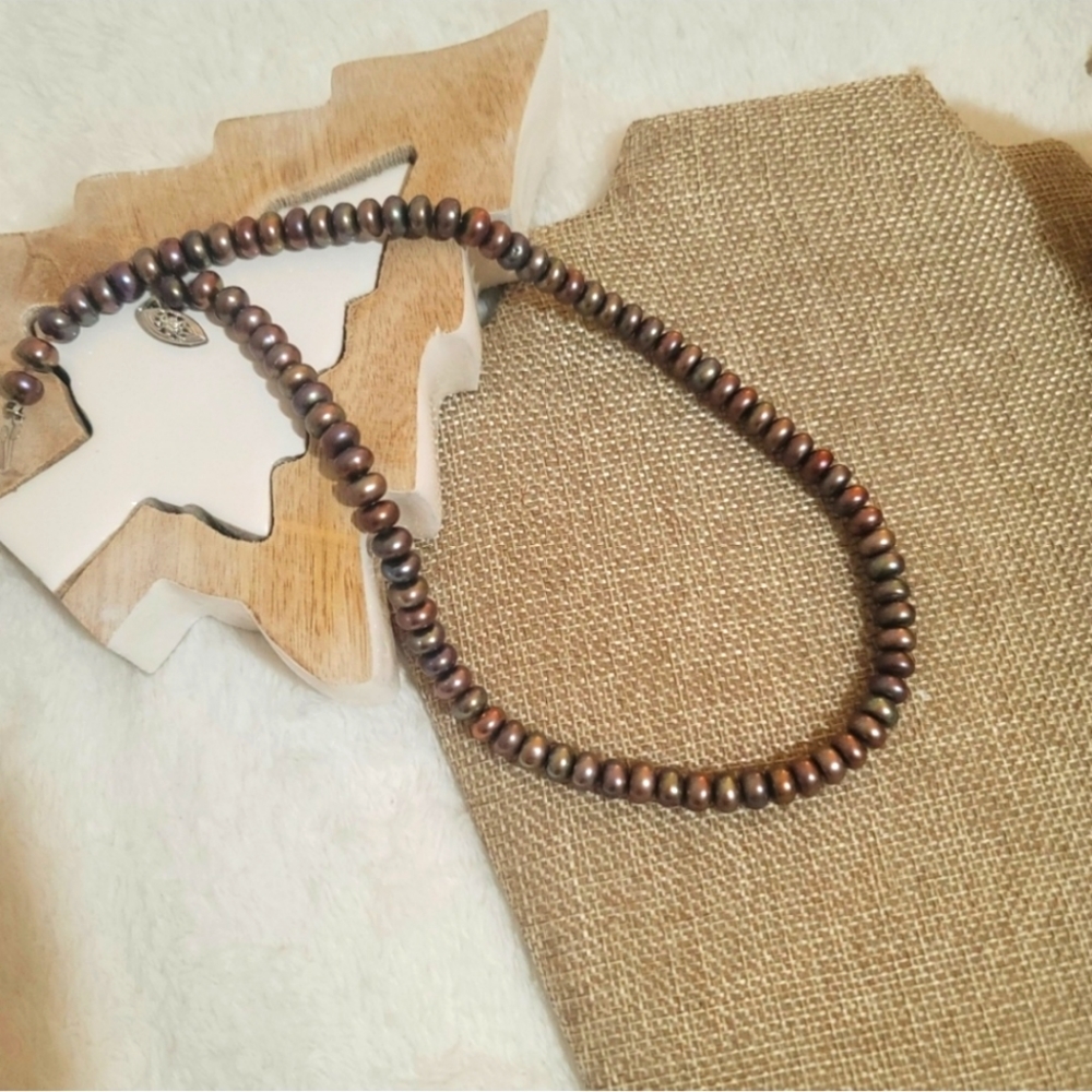 Fresh Water dyed Pearls individually knotted. 16 inch strand.